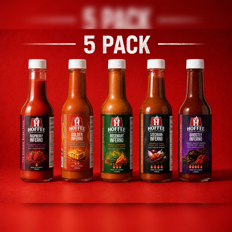Five full-size HOFFEE hot sauce bottles